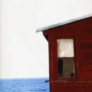 Prezzo Di Fabbrica Un cuore rosso rubino in un freddo mare blu